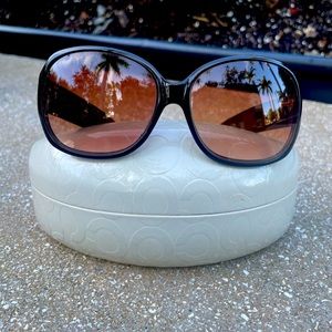 Coach women’s sunglasses in Brown.